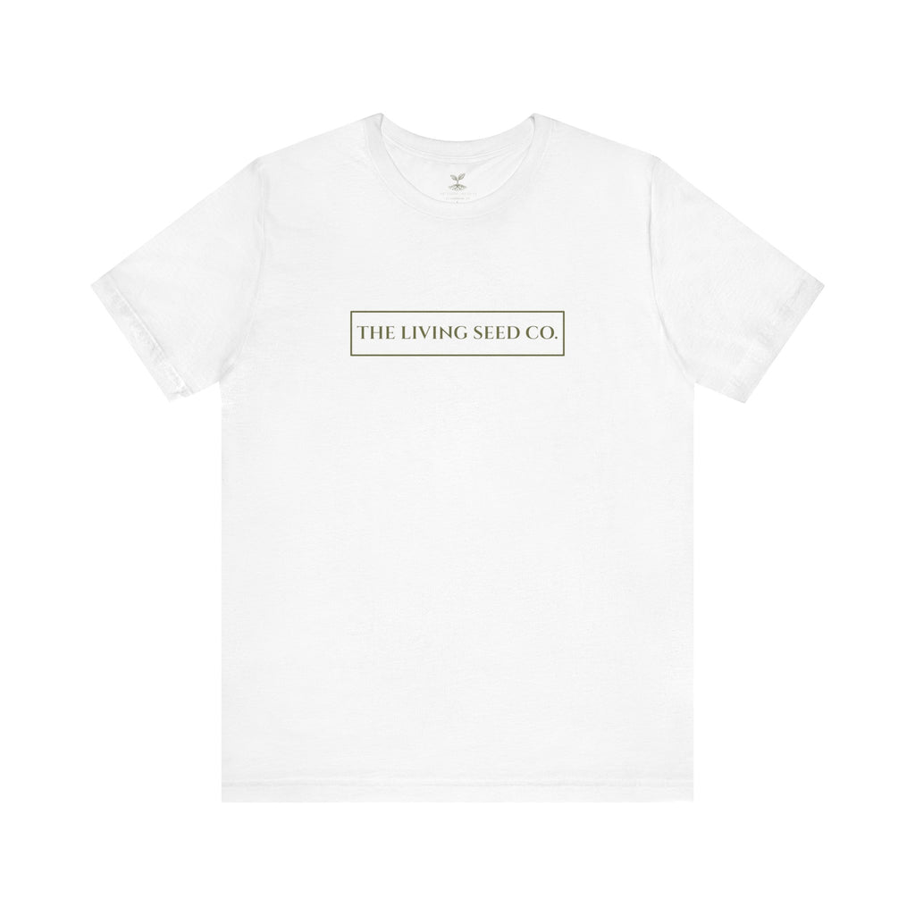 The Original Tee in White — front view flat mockup — white unisex t-shirt featuring The Living Seed Co. boxed wordmark on chest in olive ink. Bella+Canvas 3001.