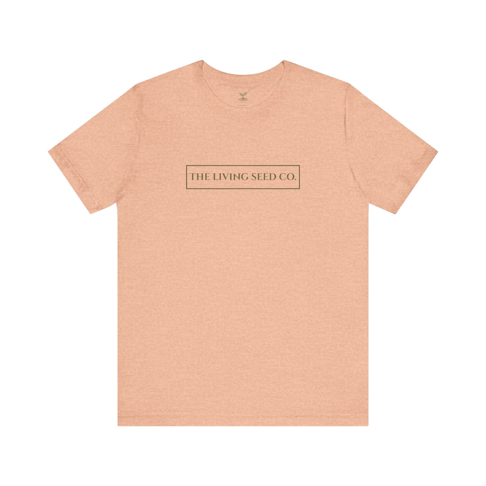 The Original Tee in Heather Peach — front view flat mockup — peach heather unisex t-shirt featuring The Living Seed Co. boxed wordmark on chest in olive ink. Bella+Canvas 3001.