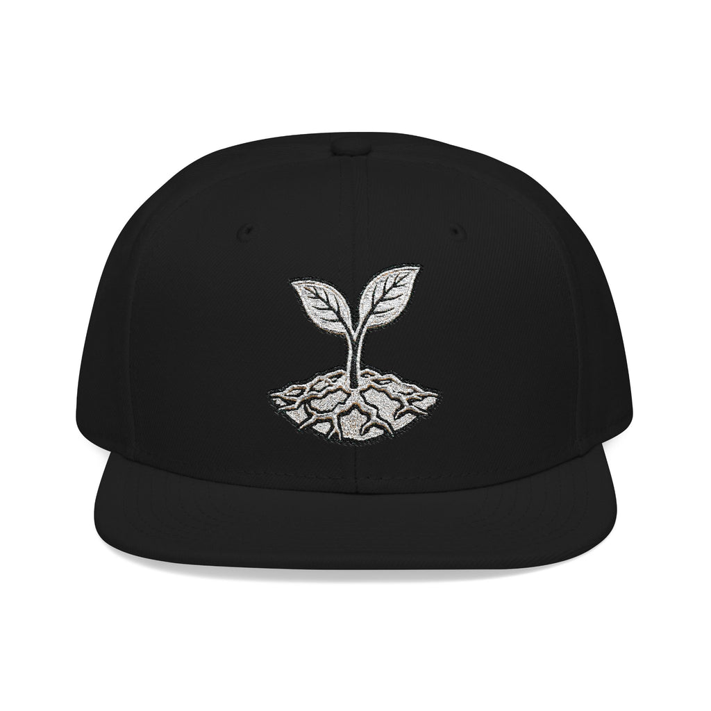 The Living Seed Co. Original Snapback in black — front view showing embroidered seedling mark, Otto Cap flat bill