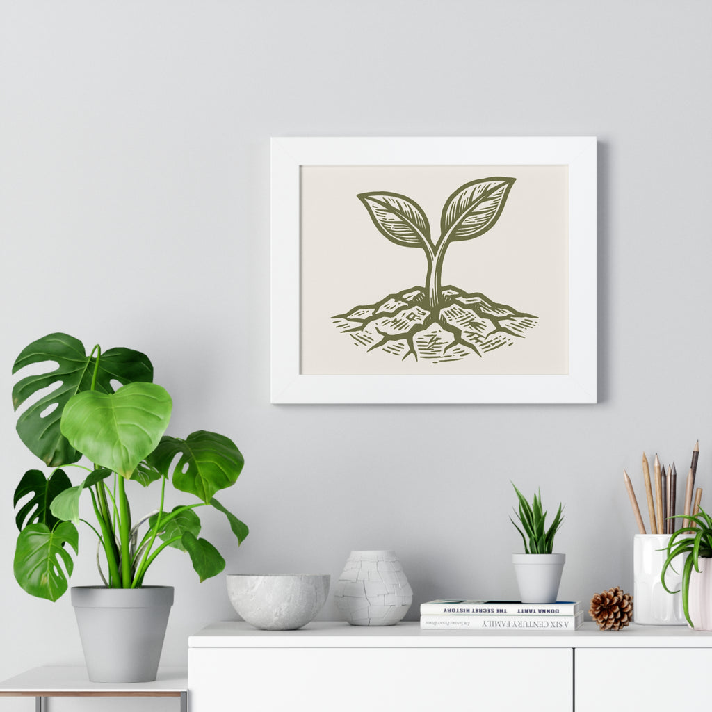 The Original Framed Poster in White hanging on a gray wall above a shelf with houseplants, featuring an etching-style sprouting seed illustration on a Parchment background