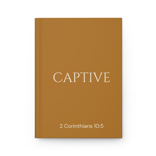 Scripture Series CAPTIVE Journal in Harvest Gold — flat mockup — harvest gold hardcover journal with CAPTIVE in parchment lettering and 2 Corinthians 10:5 reference.