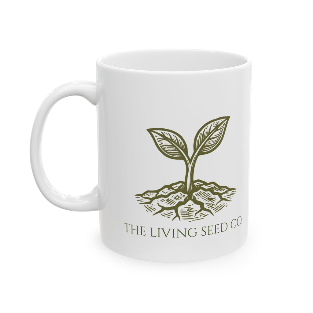 The Original Mug 11oz — flat mockup — white ceramic mug featuring The Living Seed Co. etching-style sprouting seed graphic in olive ink with wordmark below.