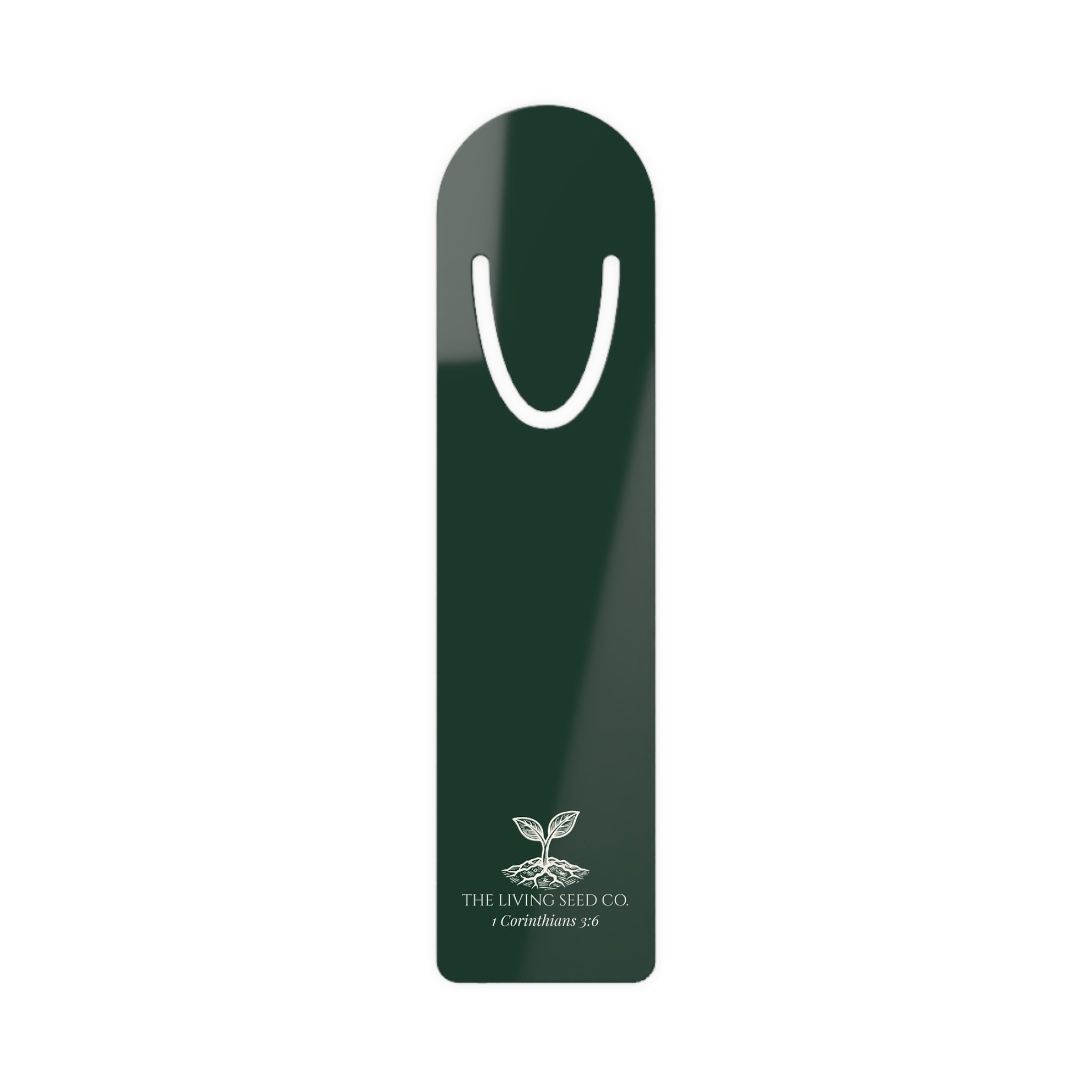 The Original Bookmark in Forest Deep — lightweight aluminum bookmark printed with The Living Seed Co. sprouting seed logo and 1 Corinthians 3:6