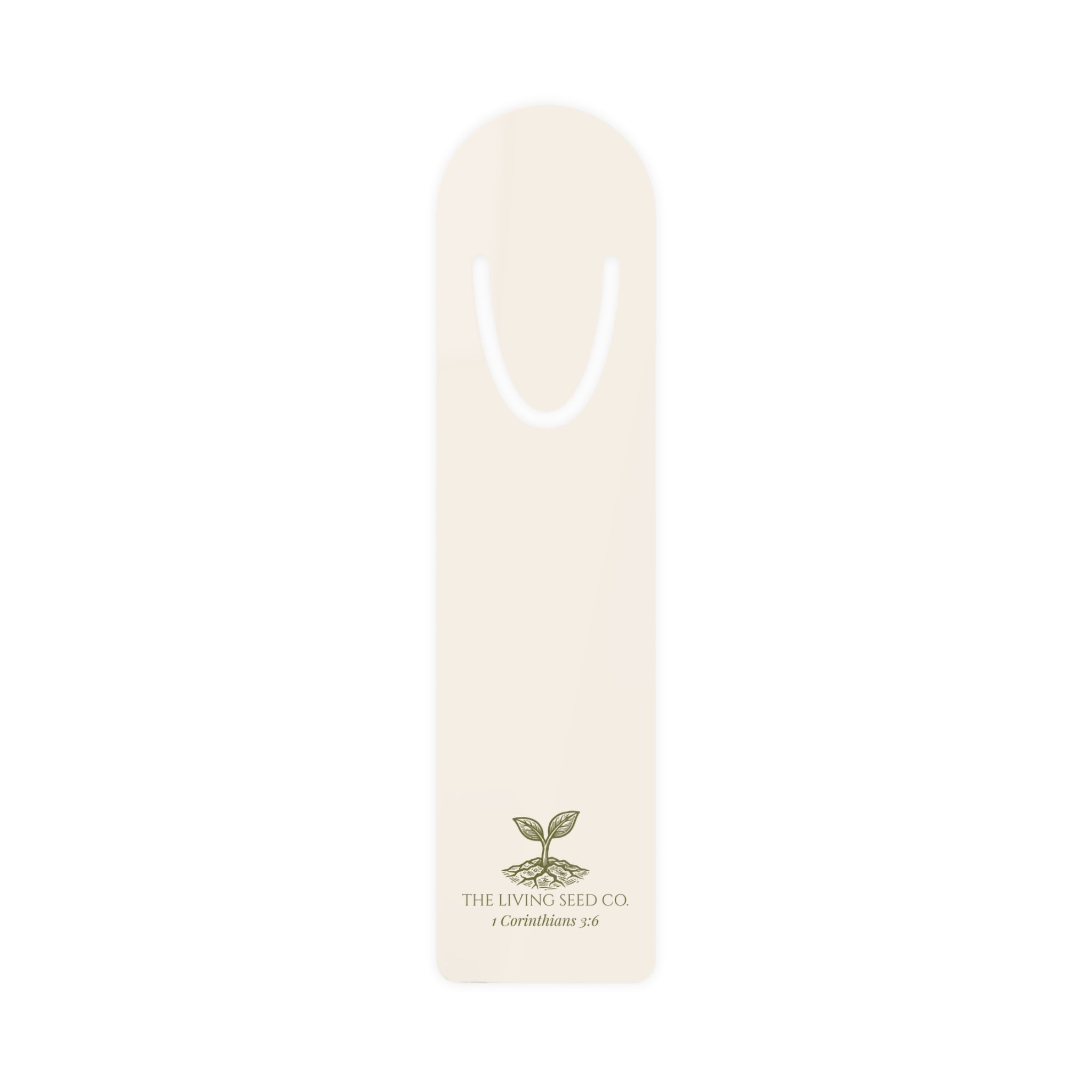 The Original Bookmark in Parchment — lightweight aluminum bookmark printed with The Living Seed Co. sprouting seed logo and 1 Corinthians 3:6