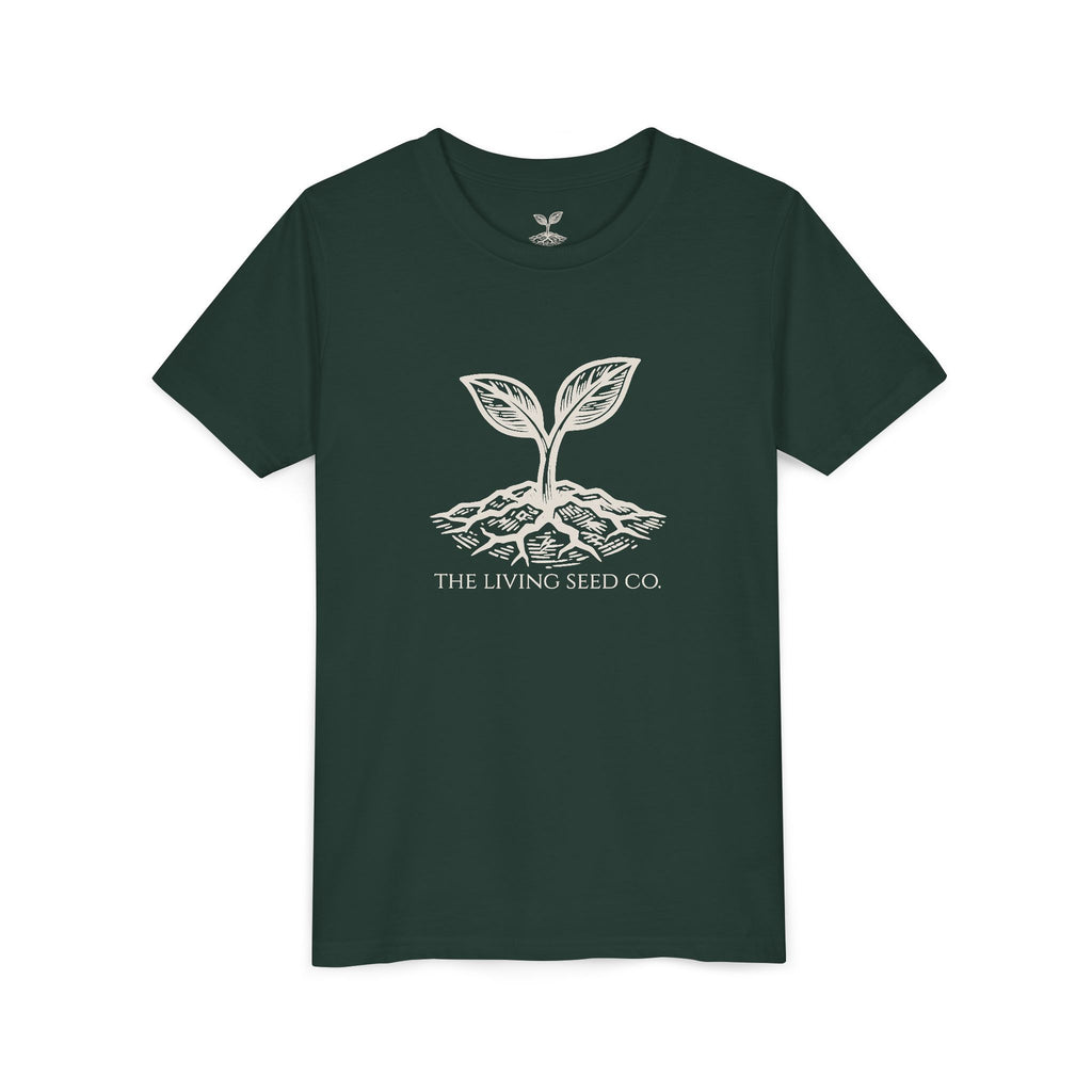 The Original Youth Tee in Forest — front view flat mockup — dark green youth t-shirt featuring The Living Seed Co. boxed wordmark on chest in parchment ink. Bella+Canvas 3001Y.