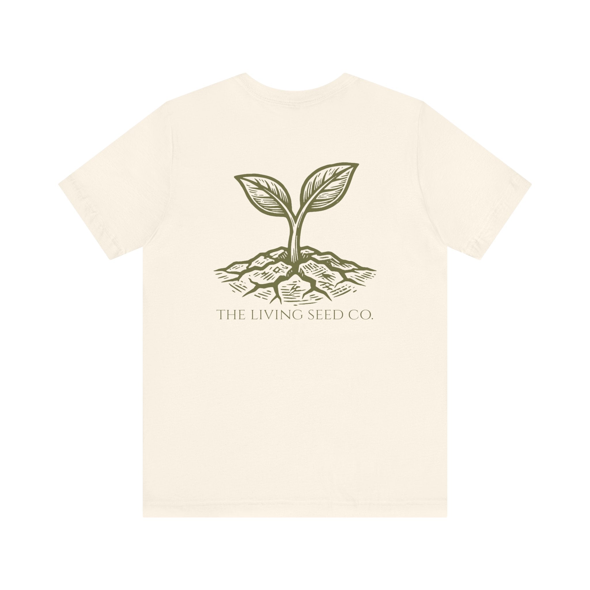 The Original Tee in Natural — back view flat mockup — cream unisex t-shirt featuring The Living Seed Co. etching-style sprouting seed graphic in olive ink with wordmark below. Bella+Canvas 3001.