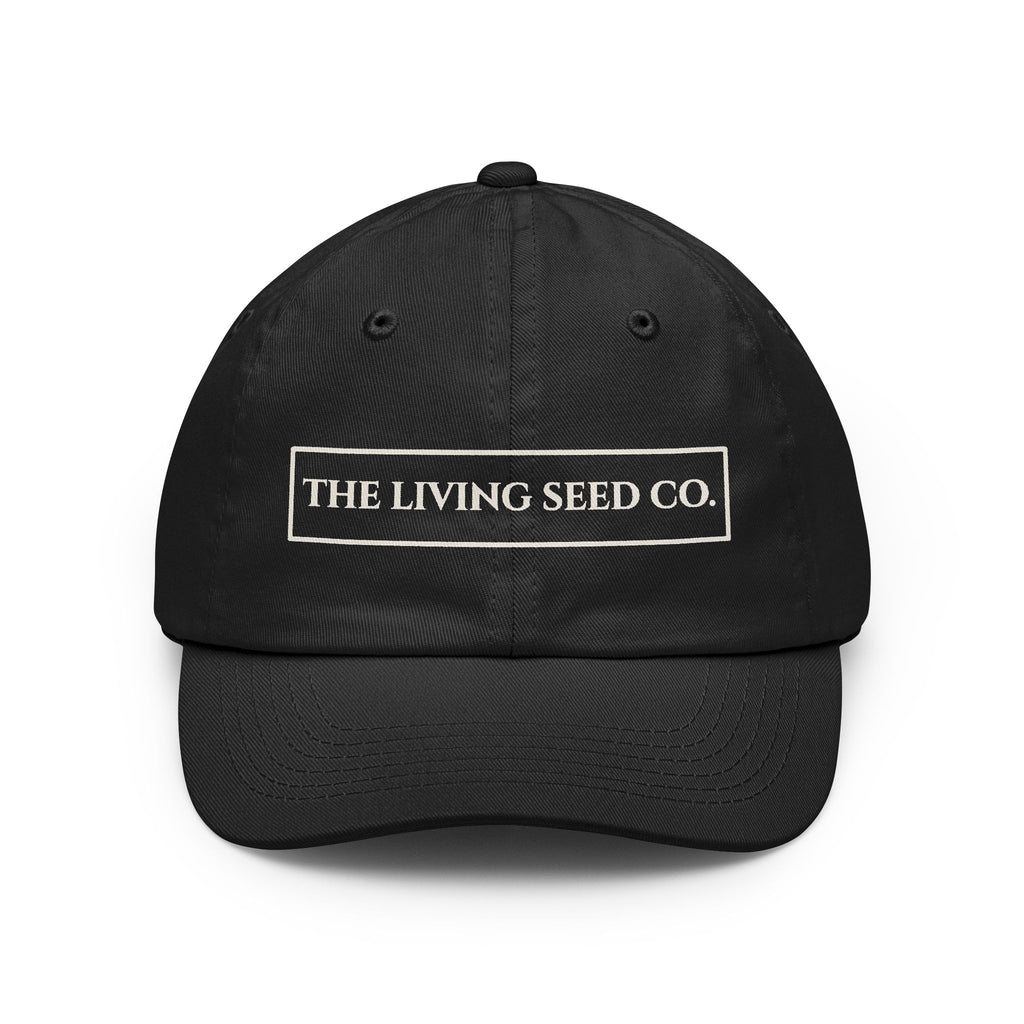 The Original Dad Hat in Black featuring The Living Seed Co. embroidered boxed wordmark on a relaxed unstructured bio-washed cotton dad hat