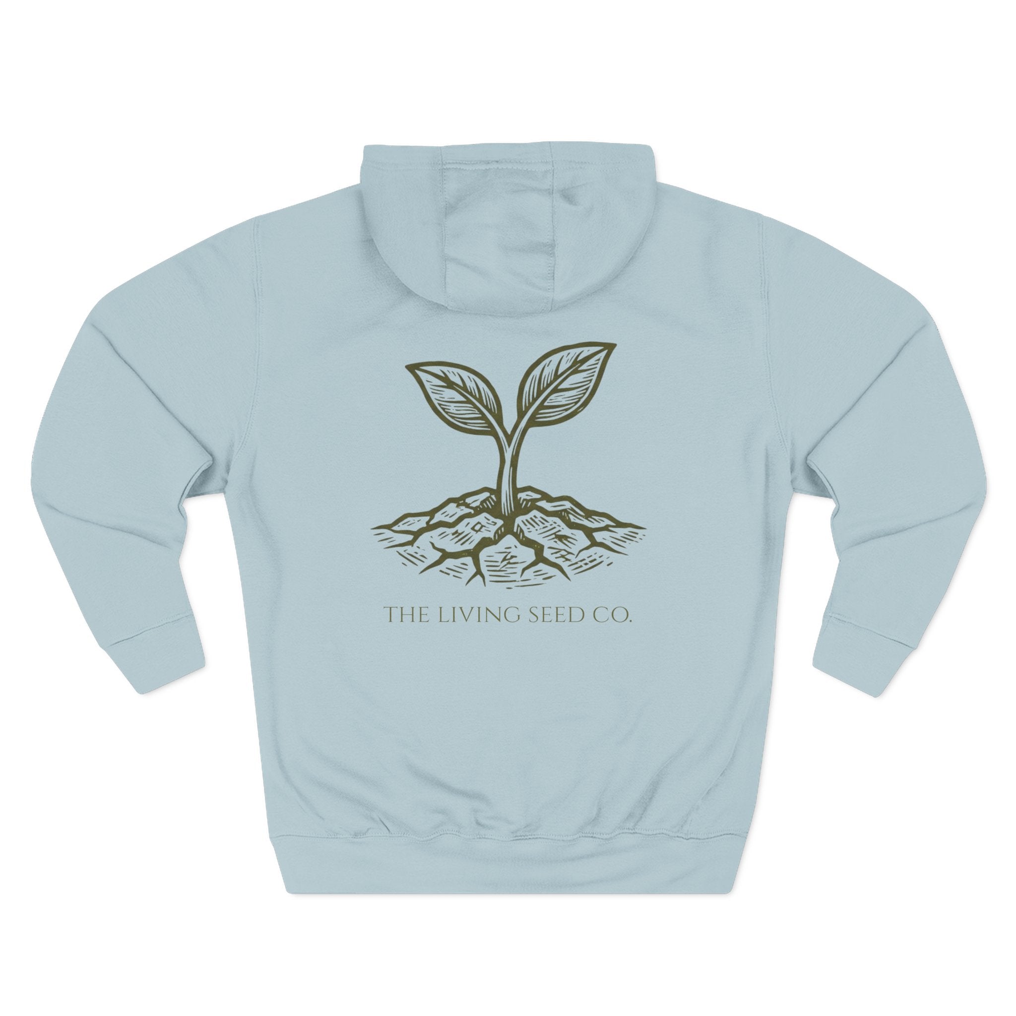 The Original Hoodie (Lane Seven) in Blue Mist — back view flat mockup — light blue pullover hoodie featuring The Living Seed Co. etching-style sprouting seed graphic in olive ink with wordmark below. Lane Seven LS14001.