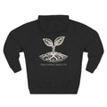 The Original Hoodie (Lane Seven) in Black — back view flat mockup — black pullover hoodie featuring The Living Seed Co. etching-style sprouting seed graphic in parchment ink with wordmark below. Lane Seven LS14001.