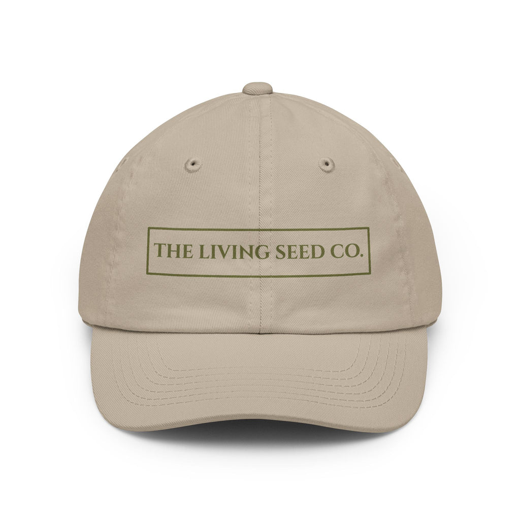 The Original Dad Hat in Stone featuring The Living Seed Co. embroidered boxed wordmark on a relaxed unstructured bio-washed cotton dad hat
