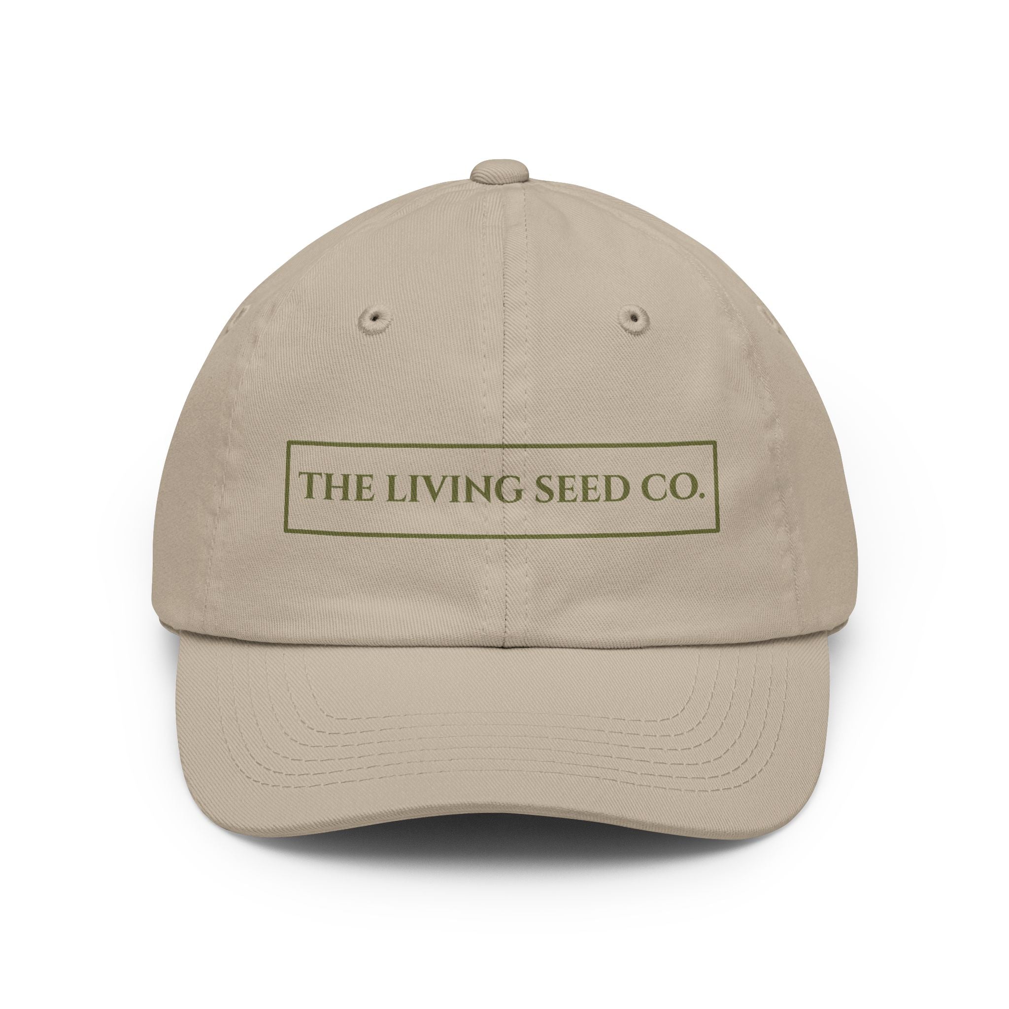 The Original Dad Hat in Stone featuring The Living Seed Co. embroidered boxed wordmark on a relaxed unstructured bio-washed cotton dad hat