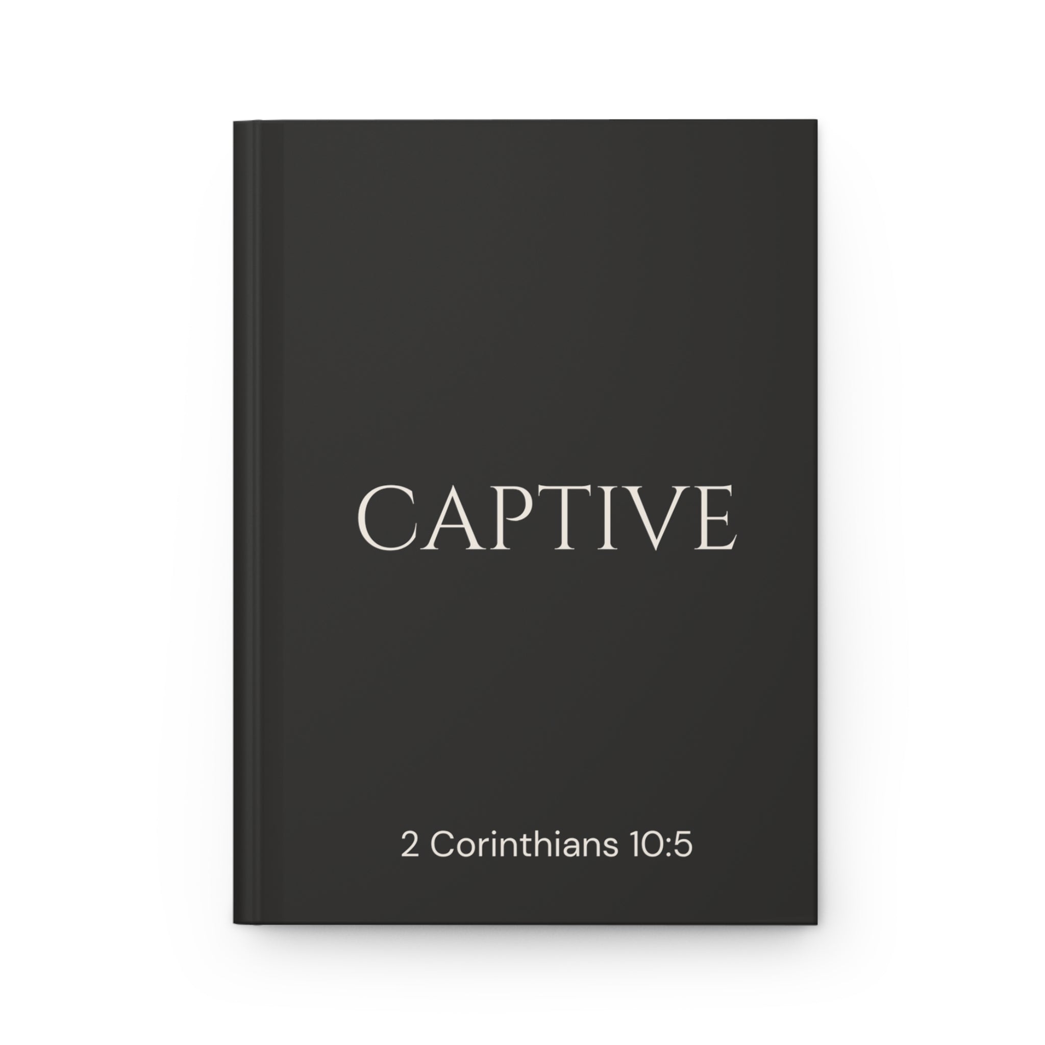Scripture Series CAPTIVE Journal in Midnight Black — flat mockup — black hardcover journal with CAPTIVE in parchment lettering and 2 Corinthians 10:5 reference.