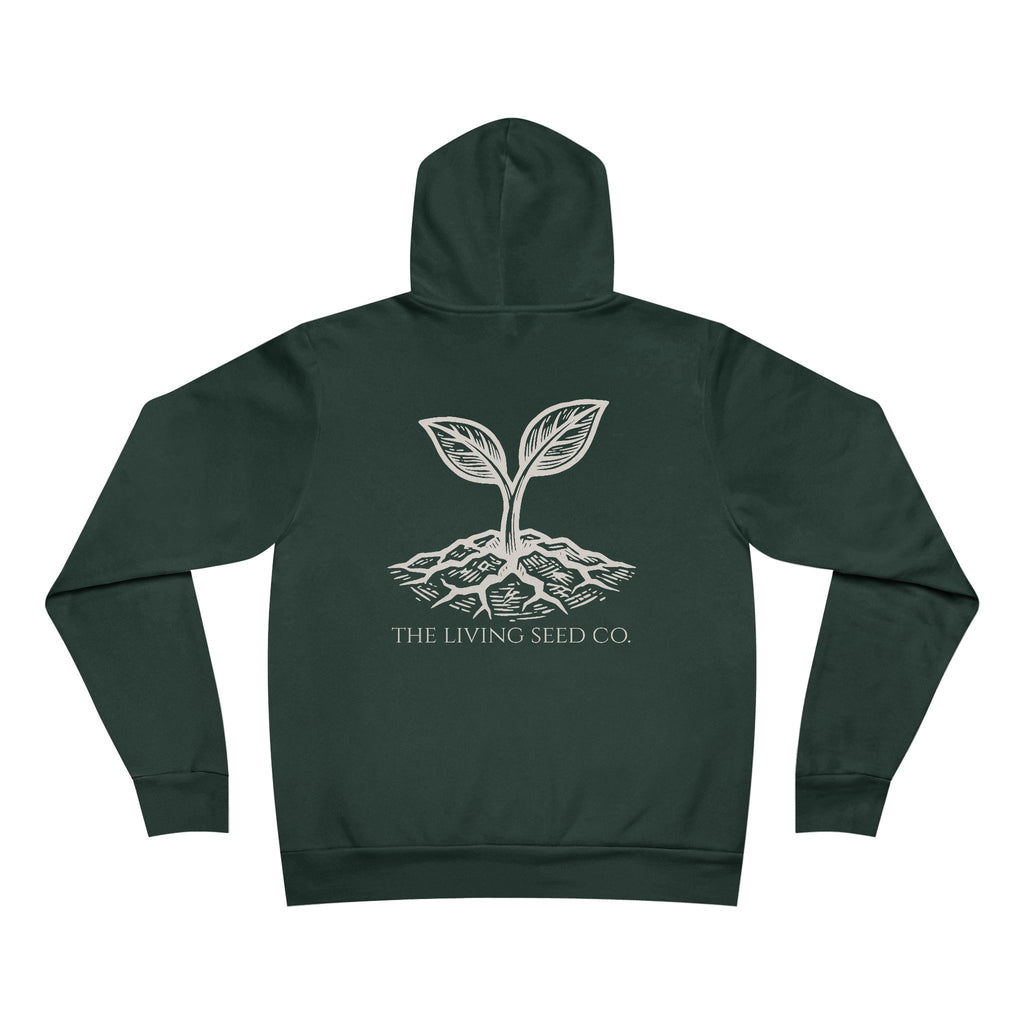 The Original Hoodie (Bella+Canvas) in Forest — back view flat mockup — forest green unisex pullover hoodie featuring The Living Seed Co. etching-style sprouting seed graphic in parchment ink with wordmark below. Bella+Canvas 3719.