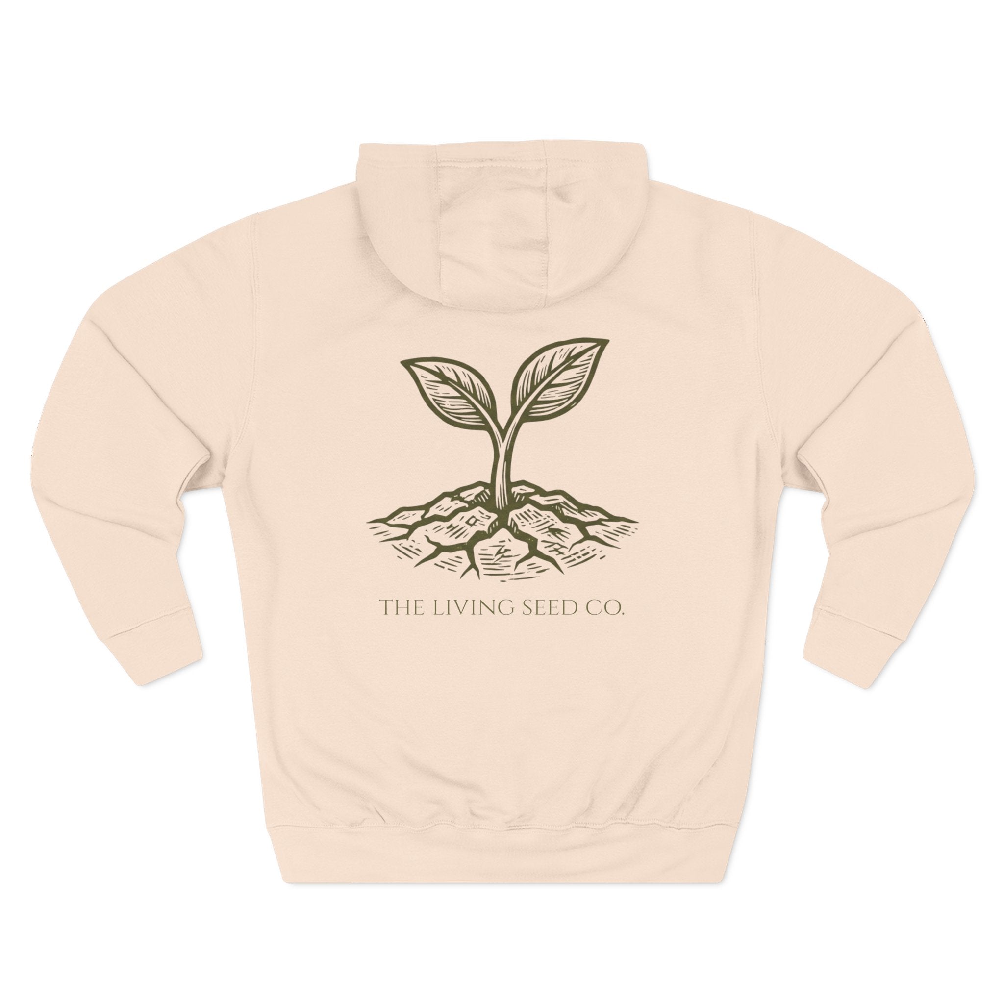 The Original Hoodie (Lane Seven) in Pale Pink — back view flat mockup — sandshell pullover hoodie featuring The Living Seed Co. etching-style sprouting seed graphic in olive ink with wordmark below. Lane Seven LS14001.