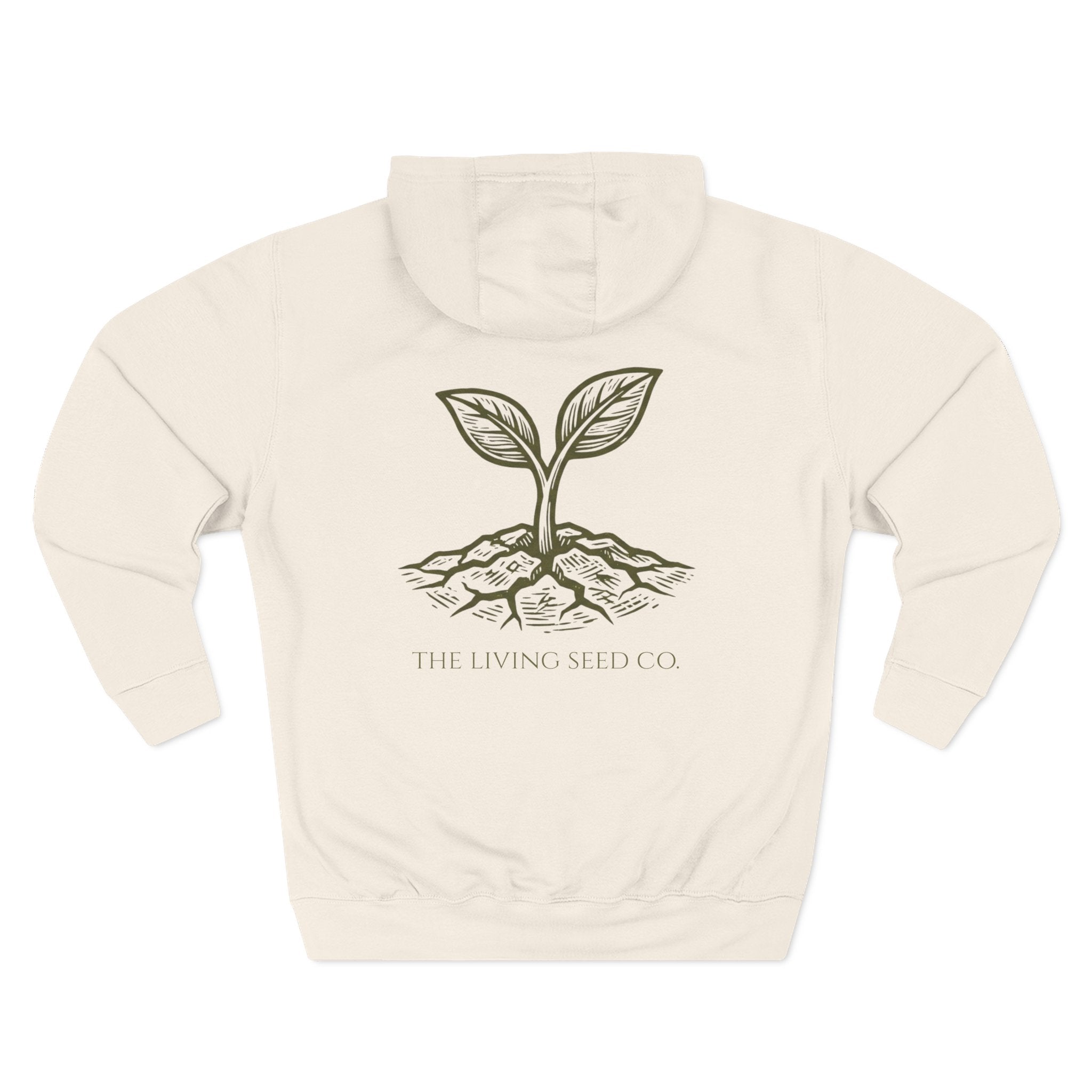 The Original Hoodie (Lane Seven) in Sandshell — back view flat mockup — sandshell pullover hoodie featuring The Living Seed Co. etching-style sprouting seed graphic in olive ink with wordmark below. Lane Seven LS14001.