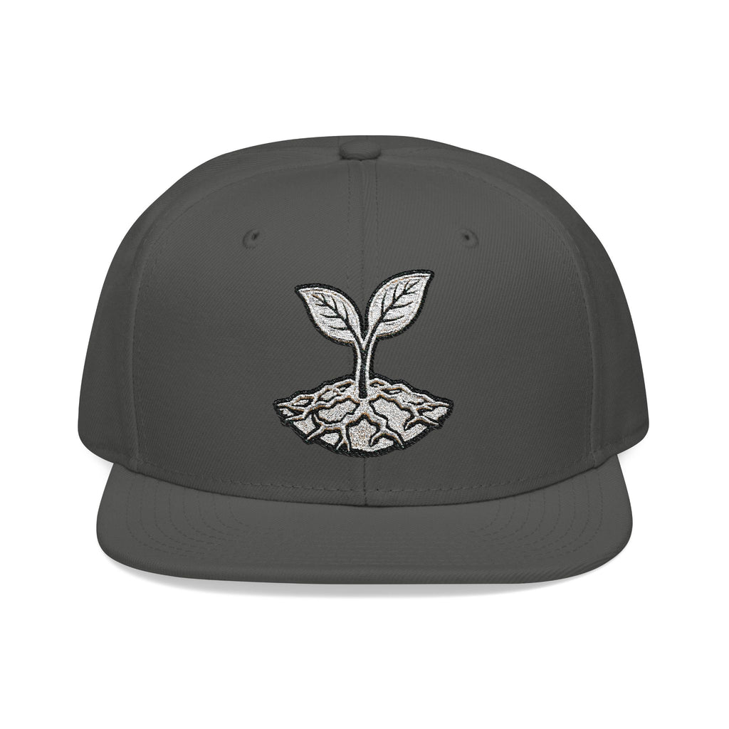 The Living Seed Co. Original Snapback in charcoal gray — front view showing embroidered seedling mark, Otto Cap flat bill