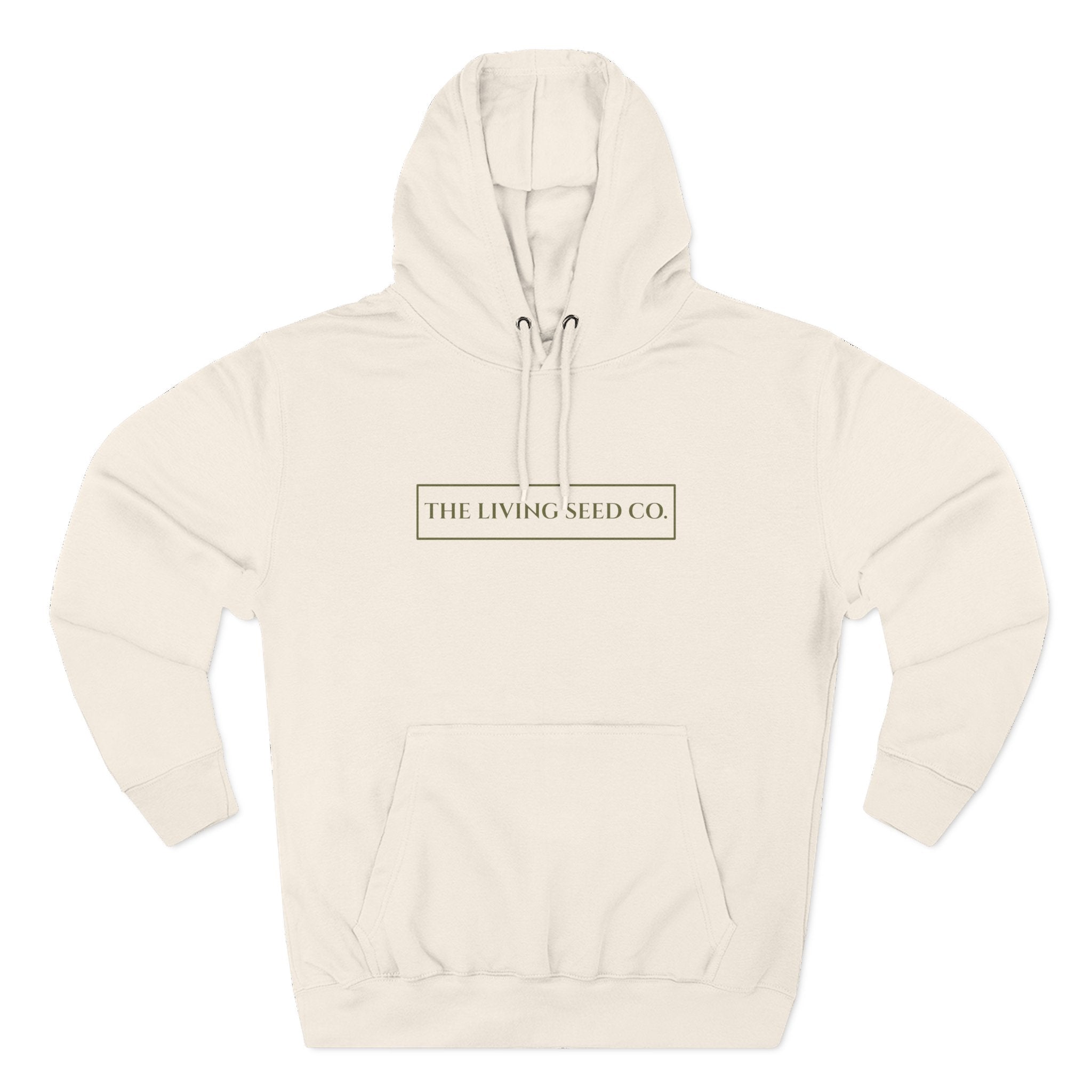 The Original Hoodie (Lane Seven) in Sandshell — front view flat mockup — sandshell pullover hoodie featuring The Living Seed Co. boxed wordmark on chest in olive ink. Lane Seven LS14001.