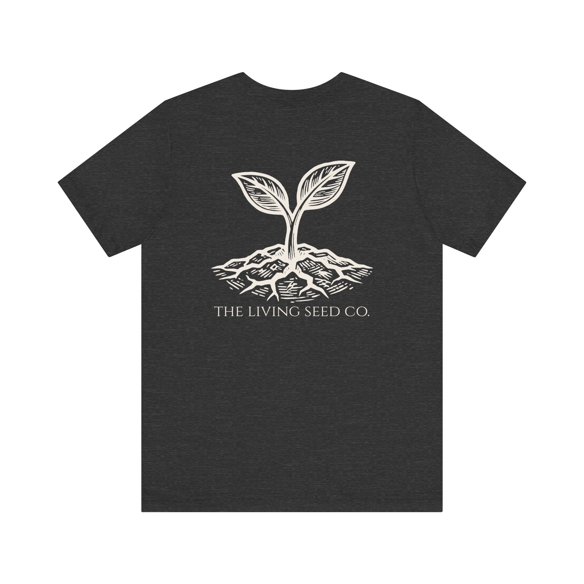 The Original Tee in Dark Heather — back view flat mockup — dark heather unisex t-shirt featuring The Living Seed Co. etching-style sprouting seed graphic in parchment ink with wordmark below. Bella+Canvas 3001.